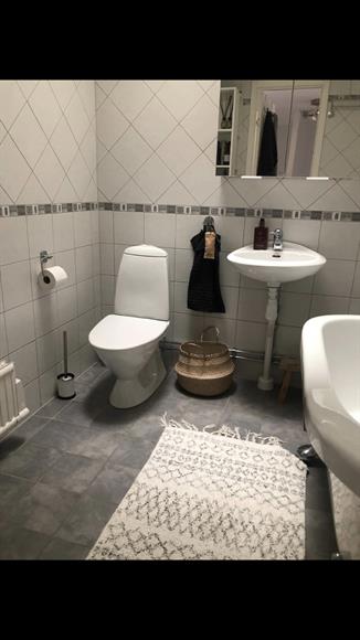 Badrum med badkar övre plan